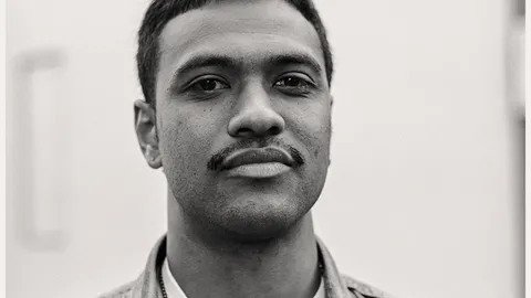 Close up portrait of man looking slightly determined.