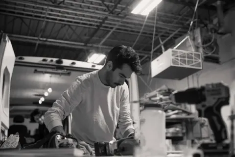 Young man in a workshop