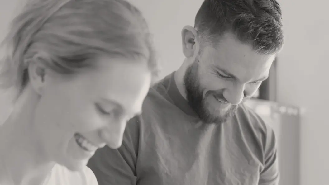 Man and his female partner sharing a smile